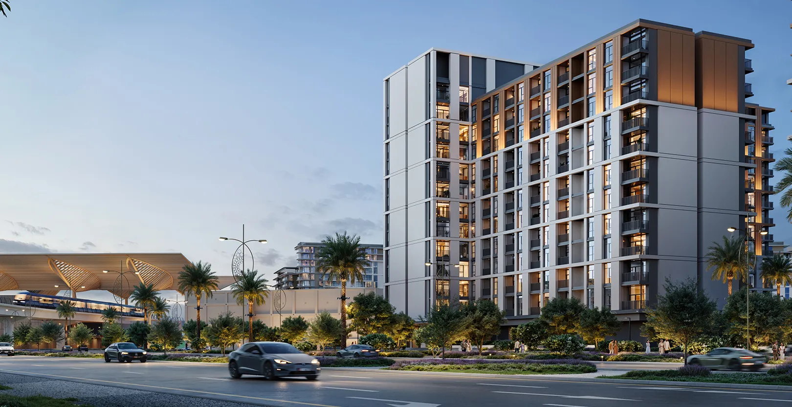 A Terra apartment building at dusk beside the boulevard