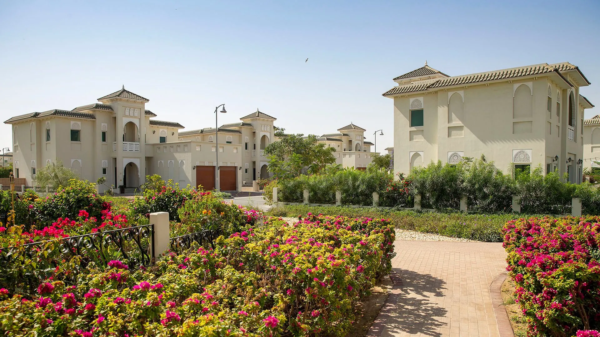 Villas behind bougainvillea